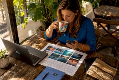 Corporate travel coordinator working at desk