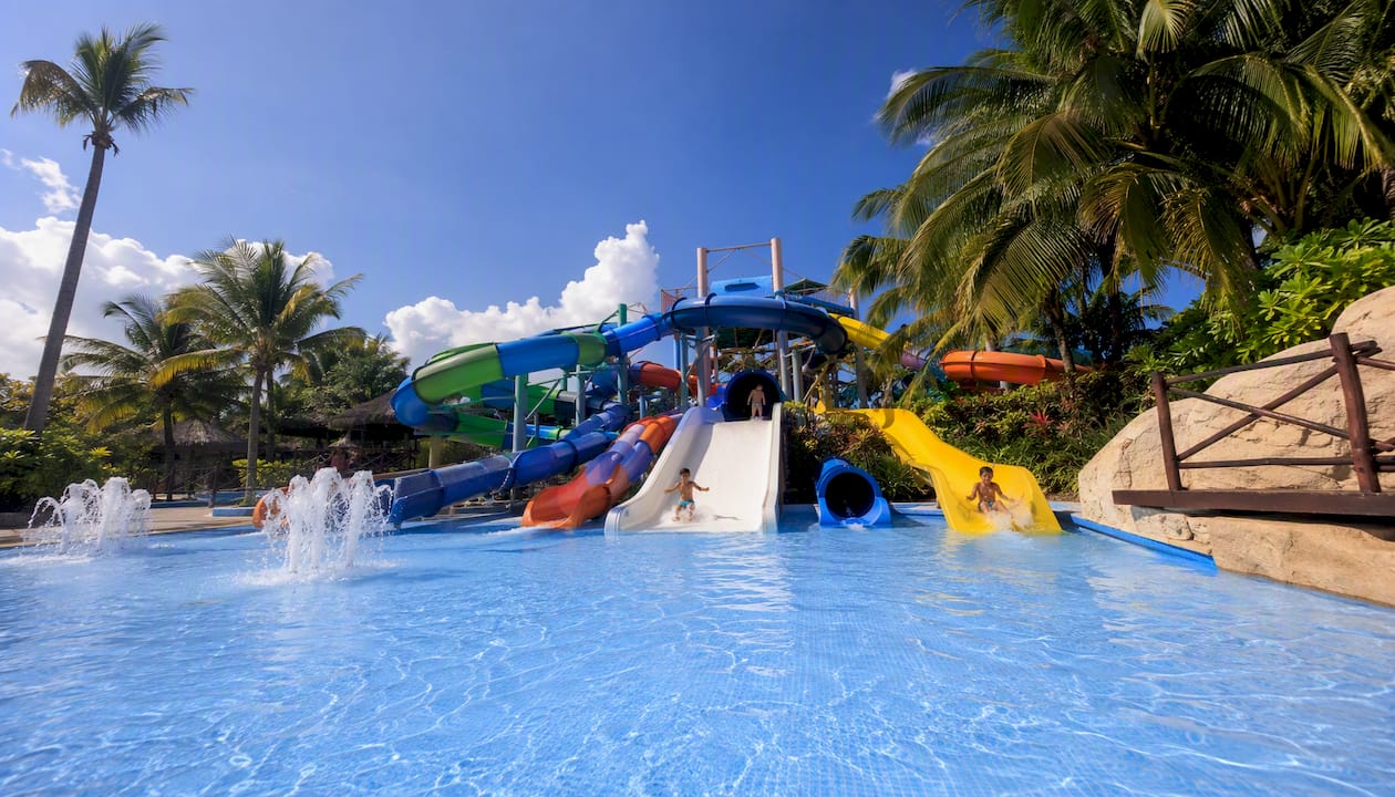 Hotel Riu Bambu: Best Value Beach Resort for Families 1 Waterpark with multiple colorful slides at Hotel Riu Bambu