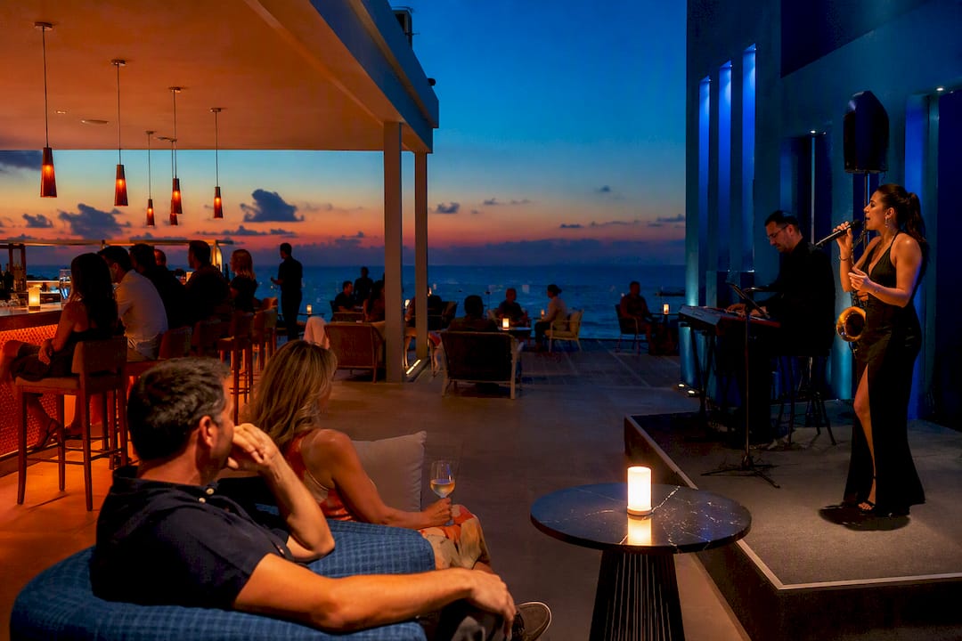 Adults Only Hotel Riu Cancun: Three Pools, Nightlife, Easy Transfers 1 Adults enjoying resort evening entertainment